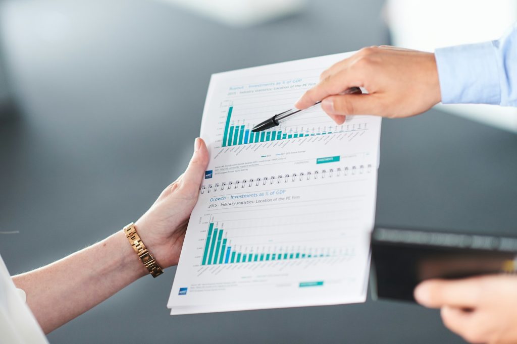 Owner and contractor reviewing commercial construction bids and scope in Los Angeles